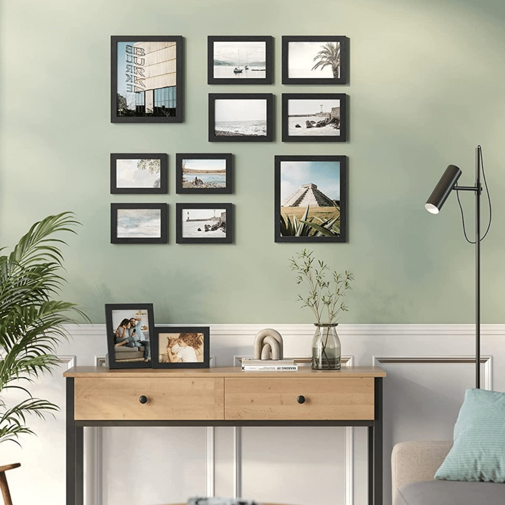 MAZAZU fotolijstjes Falorien zwart als fotowand boven een wandtafel